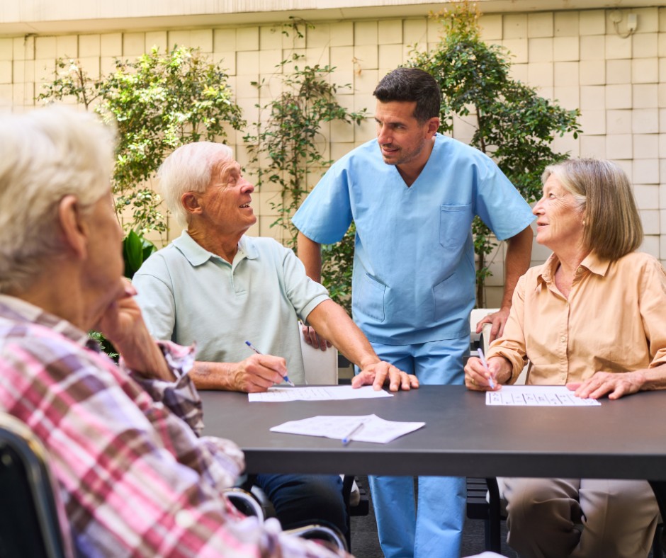man entertaining a set of elderly